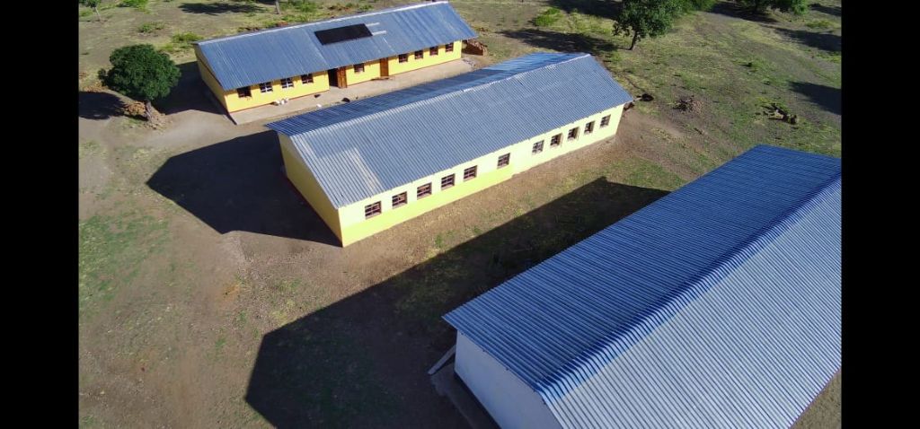 Aerial view showing all three completed classroom blocks