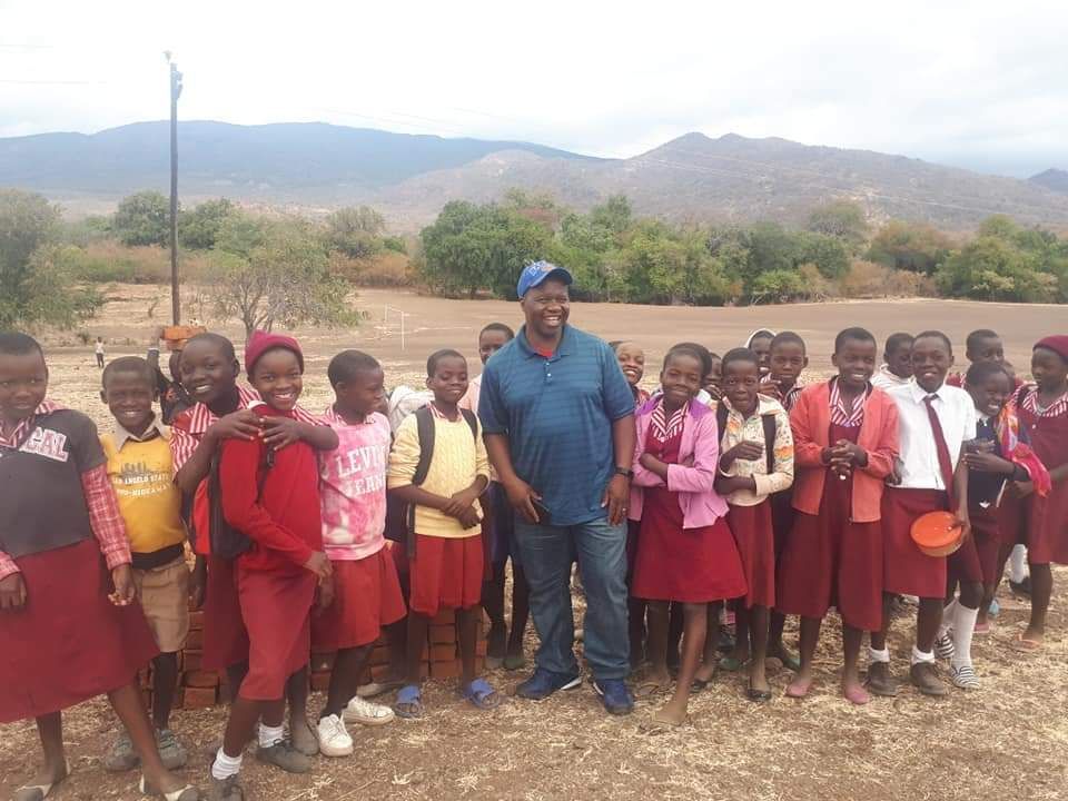 Terence Kandima with Tsenga Students