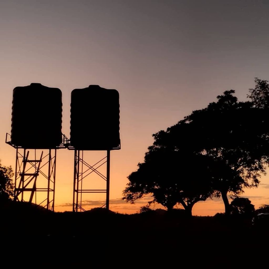 Water Storage Tanks at Sunset