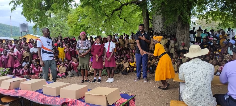 Zimbocare team presenting girls at the community ceremony