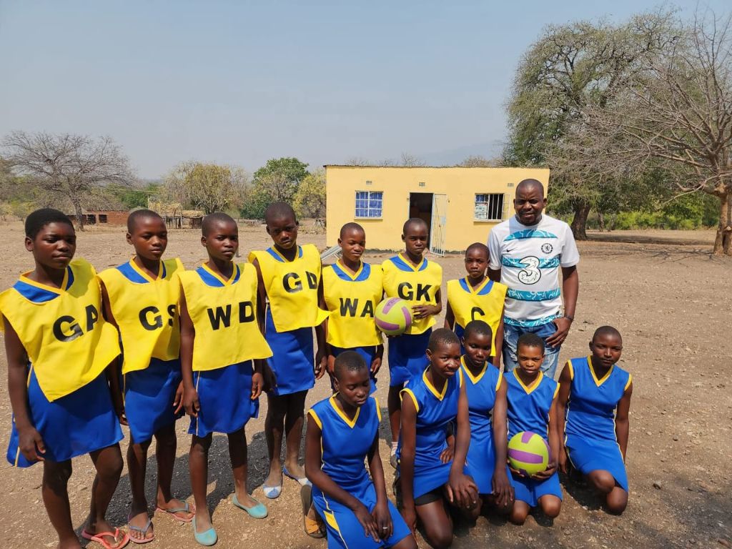 Tsenga Primary School girls netball team with position bibs