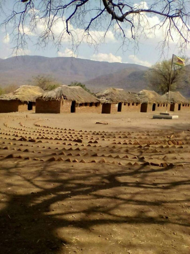Tsenga Primary School original mud-brick and thatched classrooms — the photo that inspired Zimbocare Trust